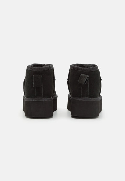 Schwarz gefütterte Stiefeletten